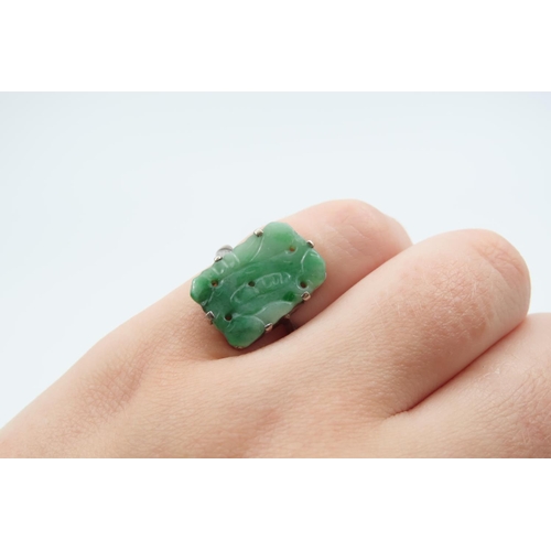 64 - Carved Jade Panel Set Jade Ring Mounted on 9 Carat White Gold Band Ring Size K