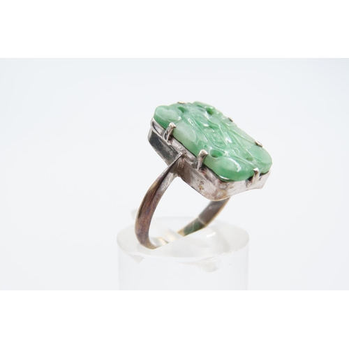 64 - Carved Jade Panel Set Jade Ring Mounted on 9 Carat White Gold Band Ring Size K