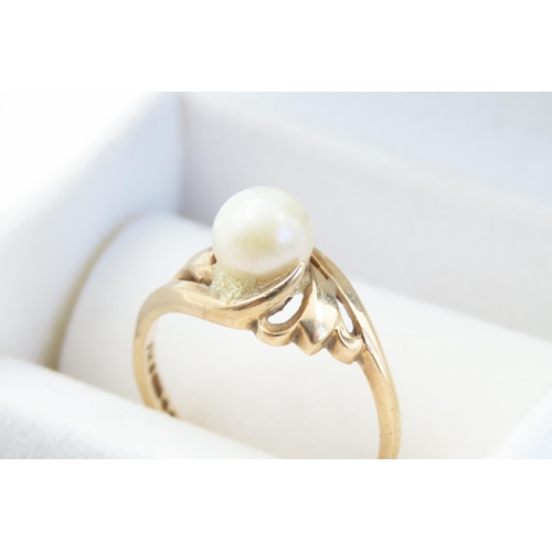 18 - Pearl Set Ladies Crossover Ring Mounted on 9 Carat Yellow Gold Band Ring Size O