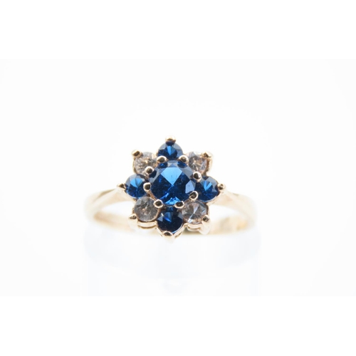 19 - Blue Topaz Ladies Cluster Ring Mounted on 9 Carat Yellow Gold Band Ring Size L