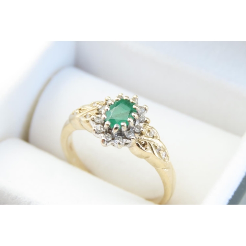 23 - Emerald and Diamond Ladies Cluster Ring Mounted on 9 Carat Yellow Gold Band Ring Size R and a Half