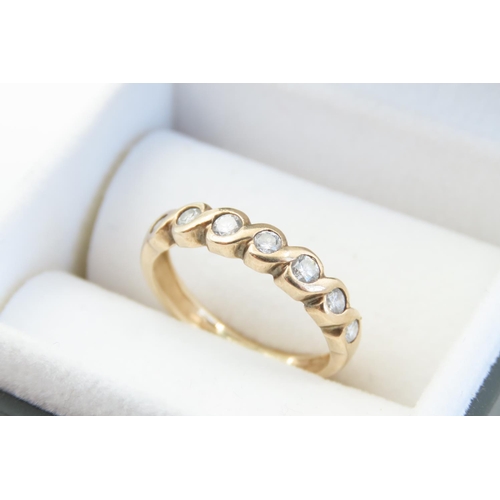 25 - Seven Stone Ladies Diamond Ring Collet Set Mounted on 9 Carat Yellow Gold Band Ring Size L