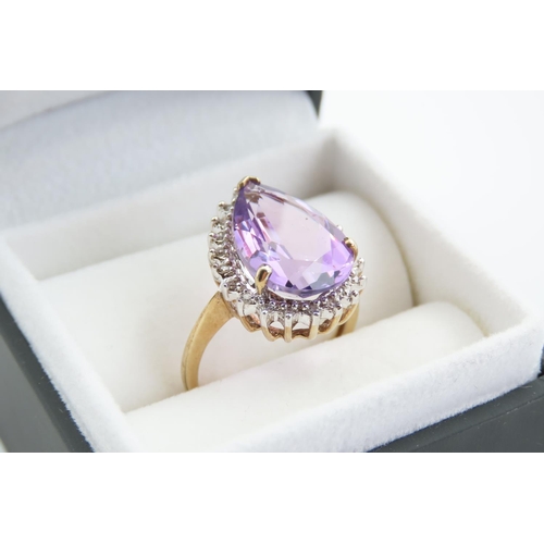 75 - Kunzite and Diamond Ladies Ring Mounted on Four Claw Setting Mounted on 9 Carat Yellow Gold Band Rin... 