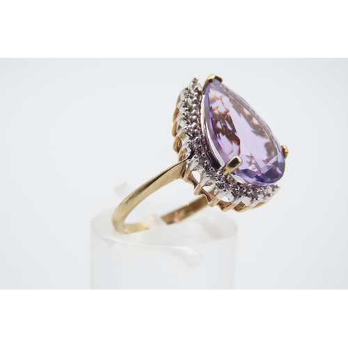 75 - Kunzite and Diamond Ladies Ring Mounted on Four Claw Setting Mounted on 9 Carat Yellow Gold Band Rin... 