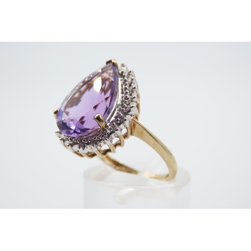 75 - Kunzite and Diamond Ladies Ring Mounted on Four Claw Setting Mounted on 9 Carat Yellow Gold Band Rin... 