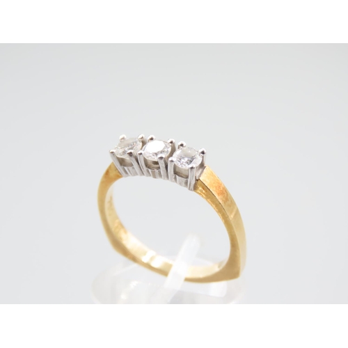 1289 - Three Stone Diamond Ring Size L Mounted on 18 Carat Yellow Gold Band