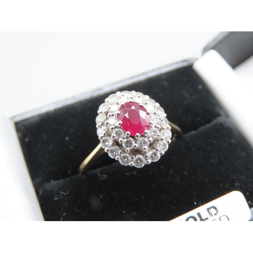 1292 - 18 Carat Ruby and Diamond Ladies Cluster Ring with Certificate Purchased New by the Vendor Ring Size... 