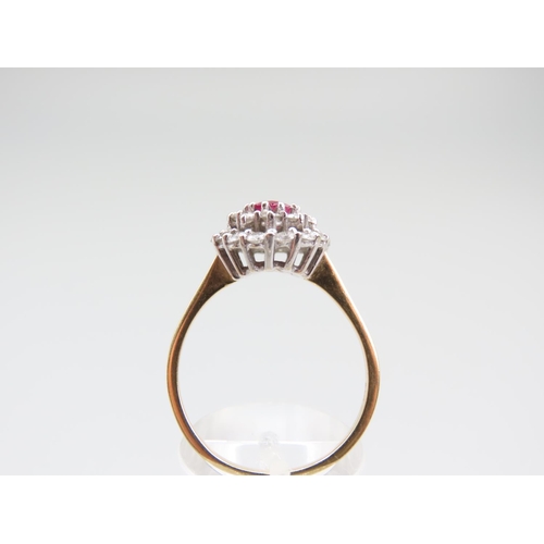 1292 - 18 Carat Ruby and Diamond Ladies Cluster Ring with Certificate Purchased New by the Vendor Ring Size... 