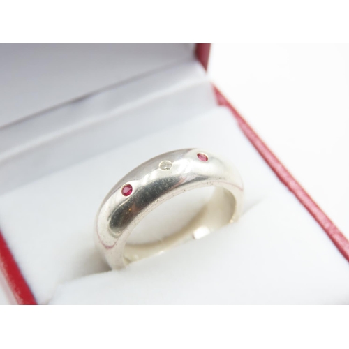 1308 - Polished Silver Ruby and Diamond Three Stone Inset Ring Band Size N