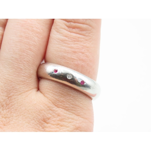 1309 - Polished Silver Ruby and Diamond Inset Ring Modernist Form Band Size V