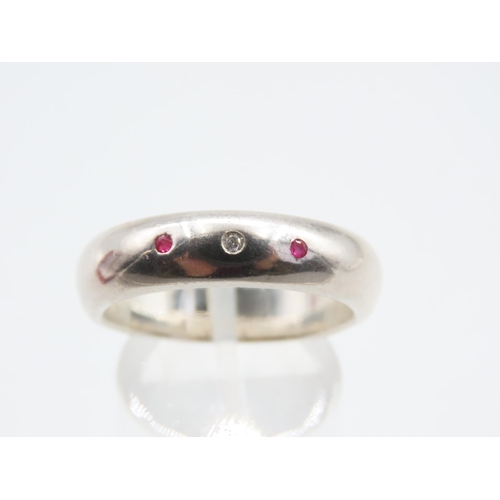 1309 - Polished Silver Ruby and Diamond Inset Ring Modernist Form Band Size V