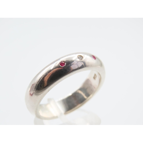 1309 - Polished Silver Ruby and Diamond Inset Ring Modernist Form Band Size V