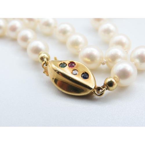 1316 - Single Strand Pearl Necklace with 14 Carat Gold Clasp Inset with Ruby Diamond and Two Sapphires Pear... 