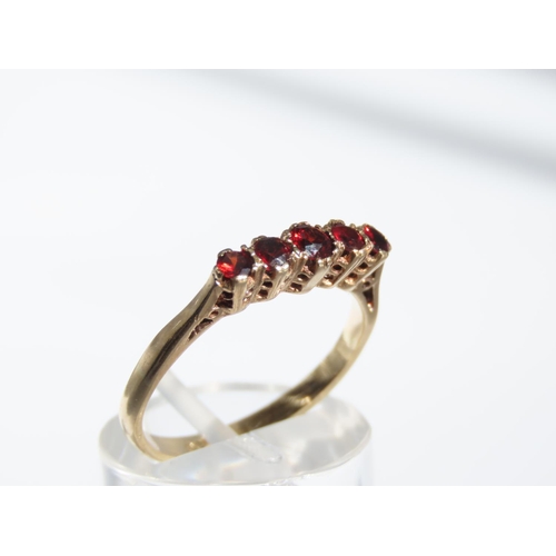 1317 - Five Stone Garnet Ring Mounted on 9 Carat Yellow Gold Band Ring Size P