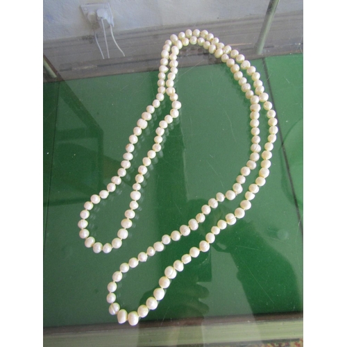 1329 - Long String of Ladies Pearls