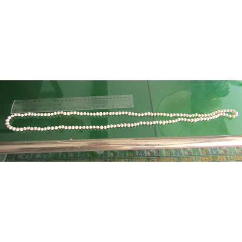 1329 - Long String of Ladies Pearls