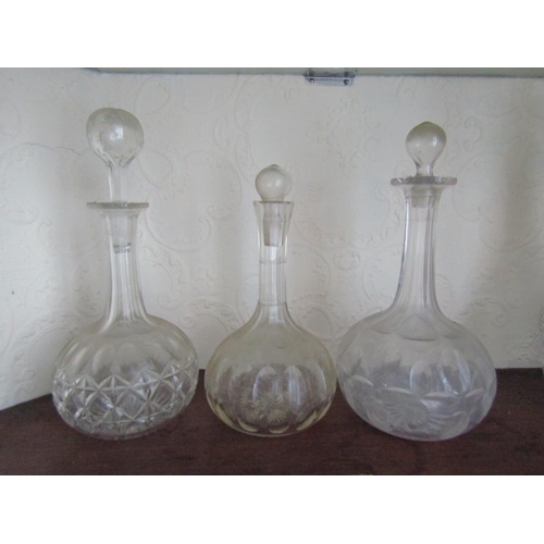 65 - Three Antique Cut Crystal Decanters with Stoppers Tallest Approximately 13 Inches High