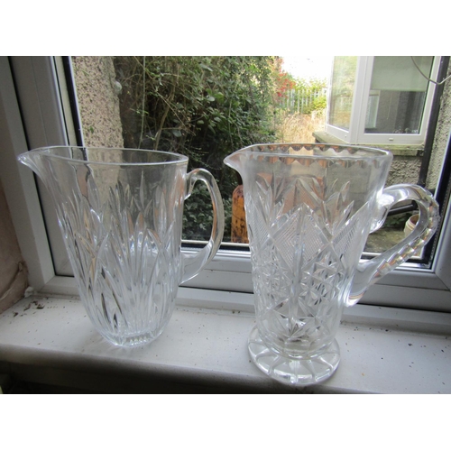 68 - Two Irish Cut Crystal Lemonade Jugs Each Tallest Approximately 11 Inches High