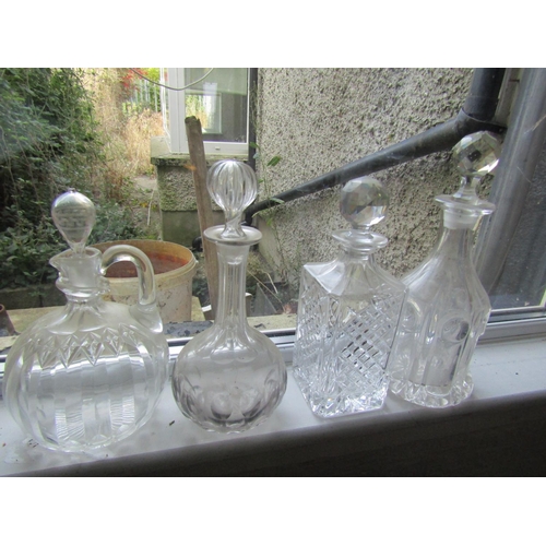 69 - Four Irish Cut Crystal Decanters Including Stoppers Tallest Approximately 12 Inches High