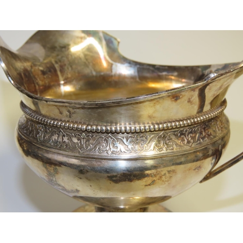 697 - Large Silver Pouring Boat Bore Motif Ring Decorated Handle Turned Pedestal Form Attractively Detaile... 