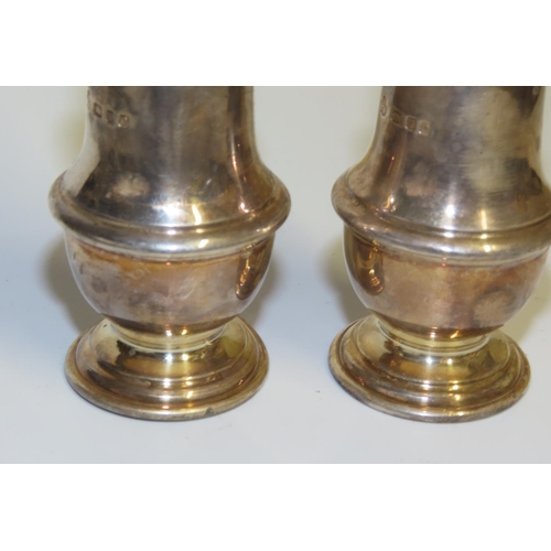 708 - Pair of Silver Pedestal Form Salt and Peppers