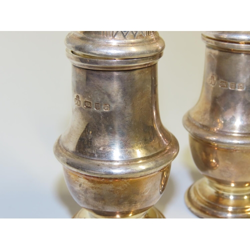 708 - Pair of Silver Pedestal Form Salt and Peppers