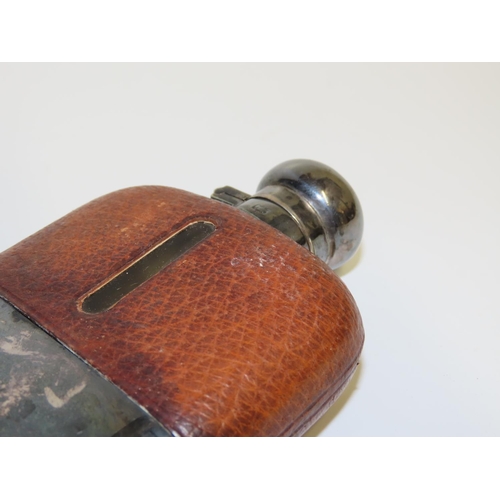 726 - Silver Cased Leather Bound Whiskey Flask with Hinged Safety Cover