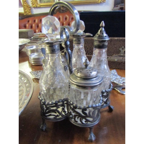 730 - Silver Mounted Cut Crystal Five Piece Table Cruet Integral Stand Shaped Supports