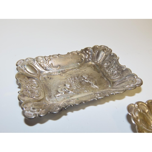 733 - Pair of Silver Rectangular Form Cherub Motif Decorated Table Dishes Attractively Detailed