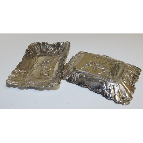 733 - Pair of Silver Rectangular Form Cherub Motif Decorated Table Dishes Attractively Detailed