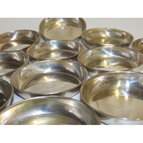 737 - Set of Twelve Silver Sweetmeat Dishes Restrained Circular Form