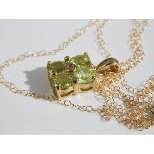 104 - Peridot Four Stone Ladies Pendant Mounted on 9 Carat Yellow Gold Set on 18 Carat Yellow Gold Chain 4... 