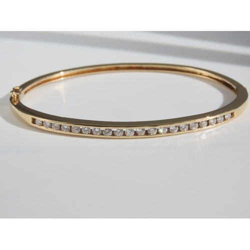 105 - Diamond Inset 14 Carat Yellow Gold Bangle Attractively Detailed Good Scintillation