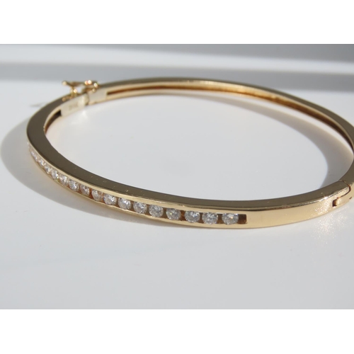 105 - Diamond Inset 14 Carat Yellow Gold Bangle Attractively Detailed Good Scintillation