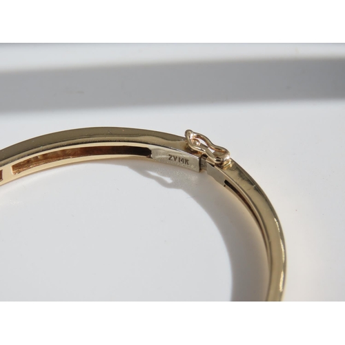 105 - Diamond Inset 14 Carat Yellow Gold Bangle Attractively Detailed Good Scintillation