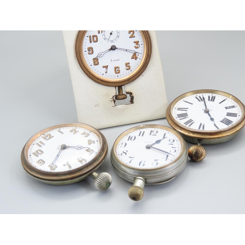 176 - Four Oversized Pocket Watches and Travel Watches The Largest 7cm Diameter