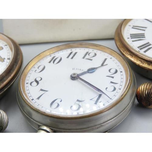 176 - Four Oversized Pocket Watches and Travel Watches The Largest 7cm Diameter