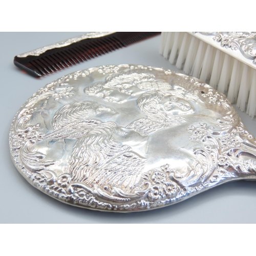 183 - Silver Mounted Three Piece Dressing Set Cherub Motif Detailing to Each Embossed Decoration Contained... 