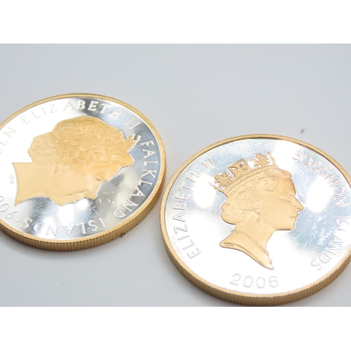 189 - Two Silver Coins with 24 Carat Gold Detailing Dated 2006