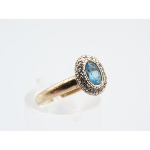 216 - Blue Topaz and Diamond Set Ladies Cluster Ring Mounted on 9 Carat Yellow Gold Band Ring Size L