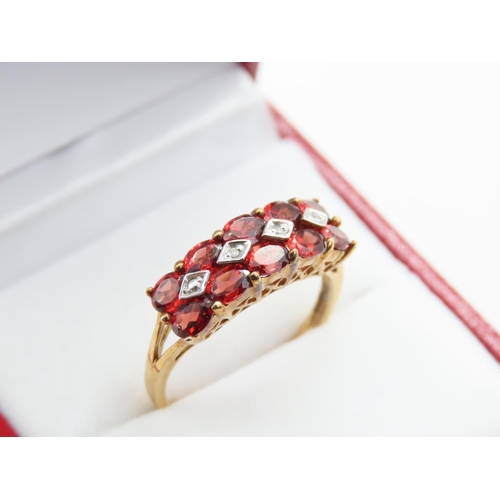 222 - Red Garnet and Diamond Set Ladies Band Ring Mounted on 9 Carat Yellow Gold Size P