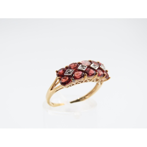 222 - Red Garnet and Diamond Set Ladies Band Ring Mounted on 9 Carat Yellow Gold Size P