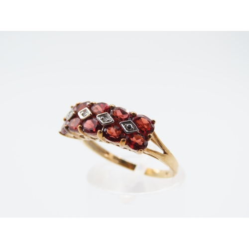 222 - Red Garnet and Diamond Set Ladies Band Ring Mounted on 9 Carat Yellow Gold Size P