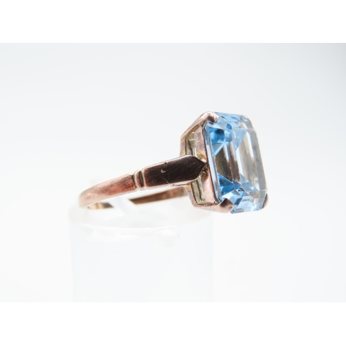 242 - Aquamarine Emerald Cut Centre Stone Ring Four Claw Setting Mounted on 9 Carat Yellow Gold Band Ring ... 