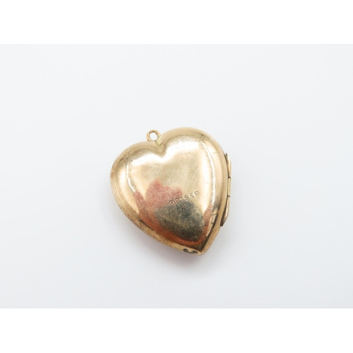 243 - 9 Carat Heart Motif Locket Pendant Incised Detailing Hinged Cover 2cm High