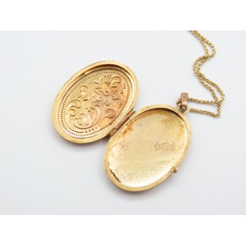 247 - 9 Carat Yellow Gold  Oval Form Locket Hinged Cover Incised Detailing 3cm High Set on 9 Carat Yellow ... 