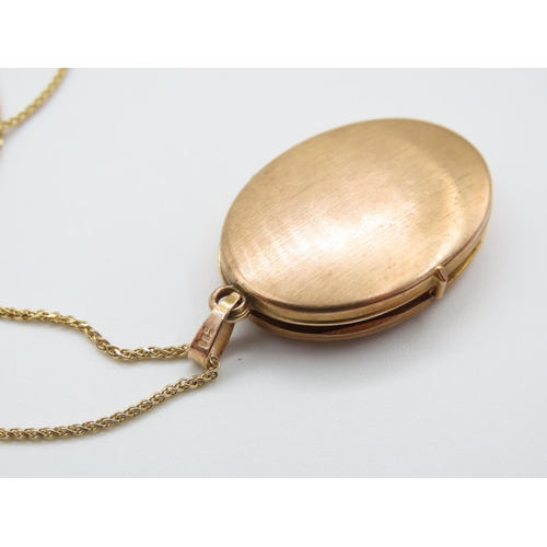 247 - 9 Carat Yellow Gold  Oval Form Locket Hinged Cover Incised Detailing 3cm High Set on 9 Carat Yellow ... 