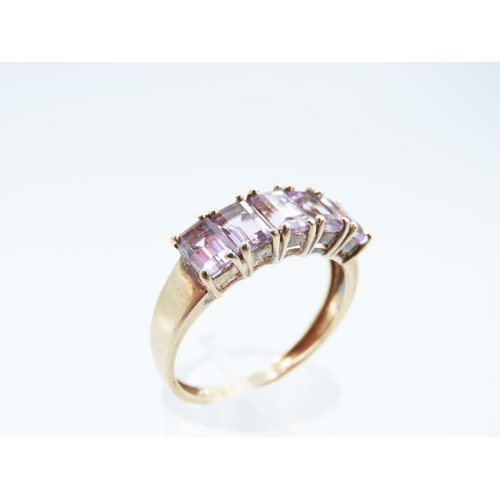 258 - Amethyst Five Stone Emerald Cut Ladies Ring Mounted on 9 Carat Yellow Gold Band Ring Size W