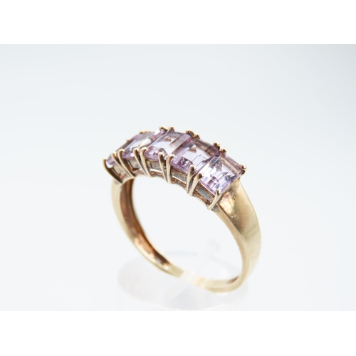 258 - Amethyst Five Stone Emerald Cut Ladies Ring Mounted on 9 Carat Yellow Gold Band Ring Size W