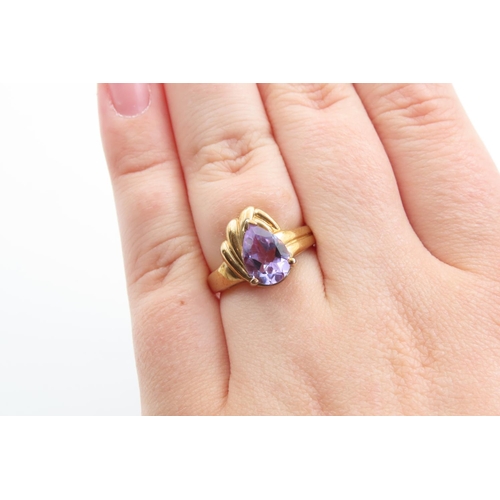26 - Amethyst Marquise Cut Centre Stone Ring Mounted on 9 Carat Yellow Gold Band Ring Size N and a Half